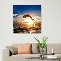 «Прыжок дельфина на фоне сияющего заката» в интерьере современной светлой гостиной над диваном