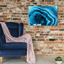 «Кольца на срезе ярко-голубого агата» в интерьере в стиле лофт с кирпичной стеной и синим креслом
