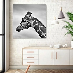«Черно-белый портрет жирафа» в интерьере комнаты в скандинавском стиле над тумбой