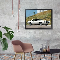 «Pontiac Firebird Trans Am '1969» в интерьере в стиле лофт с бетонной стеной