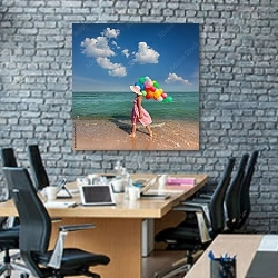 «Прогулка на пляже с цветными шарами» в интерьере современного офиса с черной кирпичной стеной