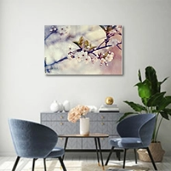 «Белые цветы вишни» в интерьере современной гостиной над комодом