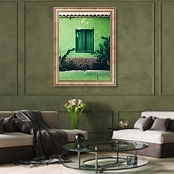 «Зеленый дом с кактусами» в интерьере гостиной в оливковых тонах