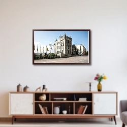 «Киев, Украина. Дом с химерами» в интерьере современной светлой гостиной над диваном