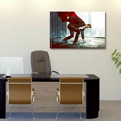 «Бизнесмен-супермен» в интерьере офиса над столом начальника