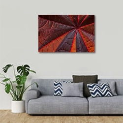«Лист цветка. Красно-оранжевый» в интерьере гостиной в скандинавском стиле с серым диваном