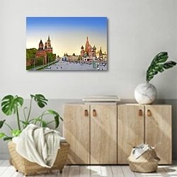 «Россия, Москва. Красная площадь на закате» в интерьере современной комнаты над комодом