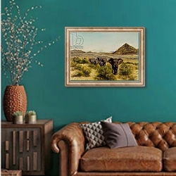 «Elephant in Samburu, 2014» в интерьере гостиной с зеленой стеной над диваном