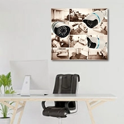 «Домашнее видеонаблюдение» в интерьере офиса над рабочим местом