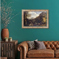 «Горный пейзаж с людьми» в интерьере гостиной с зеленой стеной над диваном
