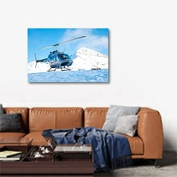 «Вертолет в снежных горах» в интерьере современной гостиной над диваном