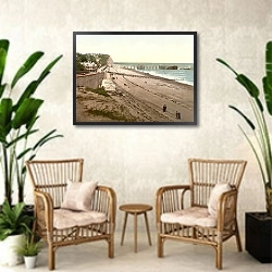 «Великобритания. Город Пенарт, пляж и пирс» в интерьере комнаты в стиле ретро с плетеными креслами