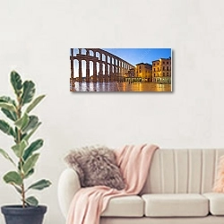 «Акведук в Сеговии в сумерках, Испания» в интерьере современной светлой гостиной над диваном