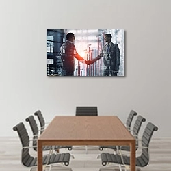 «Рукопожатие двух бизнесменов» в интерьере конференц-зала над столом для переговоров