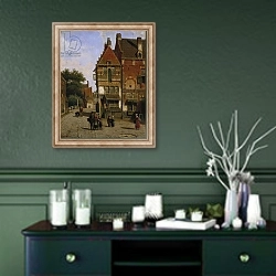 «A Dutch Street Scene» в интерьере прихожей в зеленых тонах над комодом