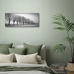 «Ряд заснеженных деревьев» в интерьере современной спальни в зеленых тонах
