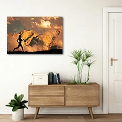 «Силуэт бегущего человека на фоне гор» в интерьере современной прихожей над тумбой
