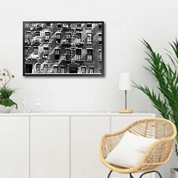 «История в черно-белых фото 303» в интерьере гостиной в скандинавском стиле над комодом