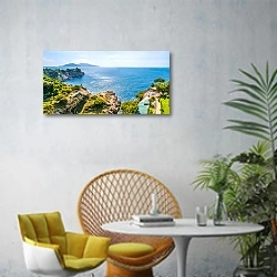 «Италия. Капри. Побережье. Панорама» в интерьере современной гостиной с желтым креслом