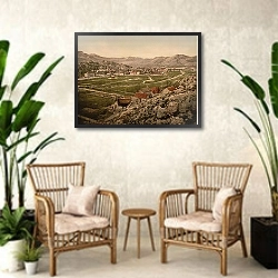 «Черногория. Цените, вид на город» в интерьере комнаты в стиле ретро с плетеными креслами