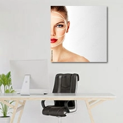 «Лицо женщины после омоложения» в интерьере офиса над рабочим местом