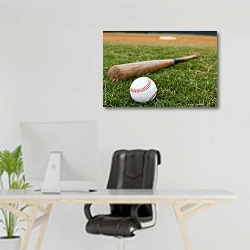 «Мяч и бита для игры в бейсбол» в интерьере офиса над рабочим местом