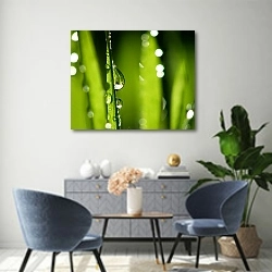 «Капли на зеленых листьях №5» в интерьере современной гостиной над комодом