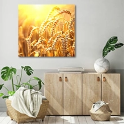 «Поле золотой пшеницы» в интерьере современной комнаты над комодом