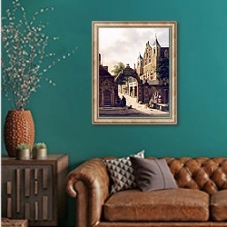 «Вид на голландскую улицу» в интерьере гостиной с зеленой стеной над диваном