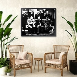 «Сталин, Черчиль и Рузвельт» в интерьере комнаты в стиле ретро с плетеными креслами