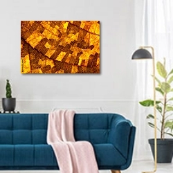 «Желтые ячейки в структуре древесного листка» в интерьере современной гостиной над синим диваном