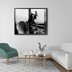 «История в черно-белых фото 733» в интерьере гостиной в скандинавском стиле с зеленым креслом