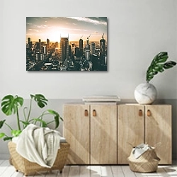 «Закат над стрящимся городом» в интерьере современной комнаты над комодом