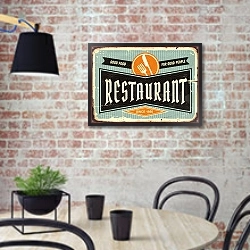 «Винтажная вывеска ресторана с ножом и вилкой» в интерьере кухни в стиле лофт с кирпичной стеной