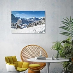 «Швейцария. Зимний горный пейзаж с шале» в интерьере современной гостиной с желтым креслом