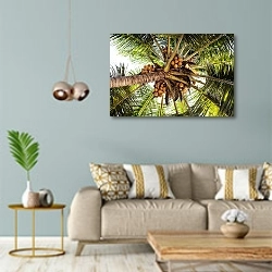 «Пальма с кокосами» в интерьере современной гостиной с голубыми стенами