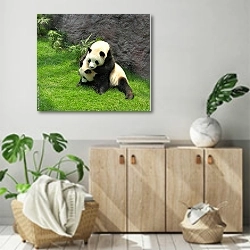 «Две играющие панды» в интерьере современной комнаты над комодом
