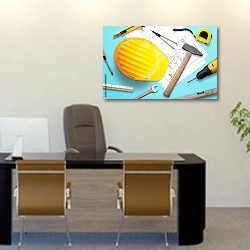 «Строительные инструменты и чертежи проекта на столе» в интерьере офиса над столом начальника