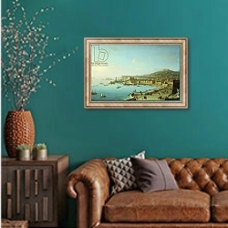 «View of Naples with the Castel Nuovo» в интерьере гостиной с зеленой стеной над диваном