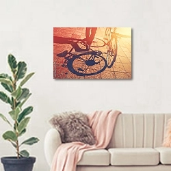 «Тень на тротуаре человека, катящего велосипед» в интерьере современной светлой гостиной над диваном