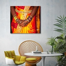 «Индийские свадебные украшения» в интерьере современной гостиной с желтым креслом