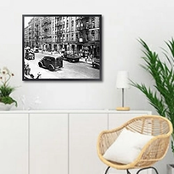 «История в черно-белых фото 749» в интерьере гостиной в скандинавском стиле над комодом