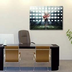 «Американский футбол на фоне прожекторов» в интерьере офиса над столом начальника