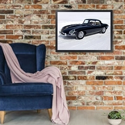 «Jaguar E-Type Roadster (Series I) '1961–67» в интерьере в стиле лофт с кирпичной стеной и синим креслом