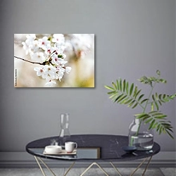 «Ветка с белыми цветками вишни» в интерьере современной гостиной в серых тонах