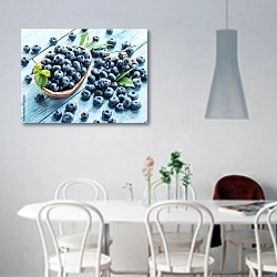 «Черника в деревянной миске на голубом столе» в интерьере светлой кухни над обеденным столом