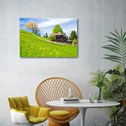 «Швейцария. Пейзаж с горным шале» в интерьере современной гостиной с желтым креслом