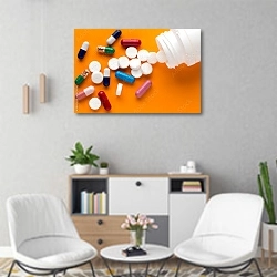 «Разноцветные таблетки и капсулы рассыпаны на оранжевом фоне» в интерьере офиса над шкафом с документами