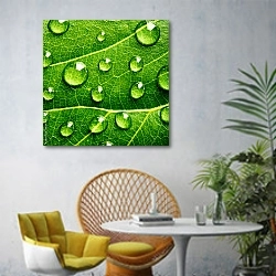 «Зеленый лист с каплями воды 6» в интерьере современной гостиной с желтым креслом