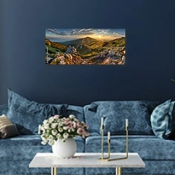 «Горы на закате, Словакия» в интерьере стильной синей гостиной над диваном